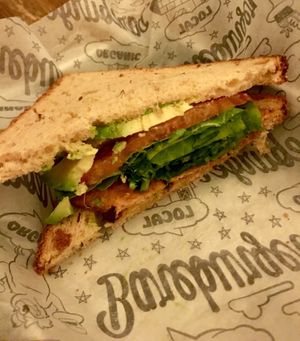 Half of “The Berk”: avocado, tomato, baby kale, onions, tempeh bacon. Supposed to have v. parm, too. at Bareburger - Ditmars in Astoria