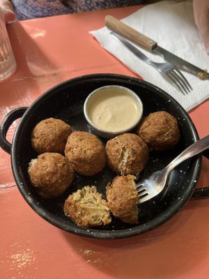 Chickpeas with a melted heart of vegan cheese   at Vegan Junkies in Lisbon