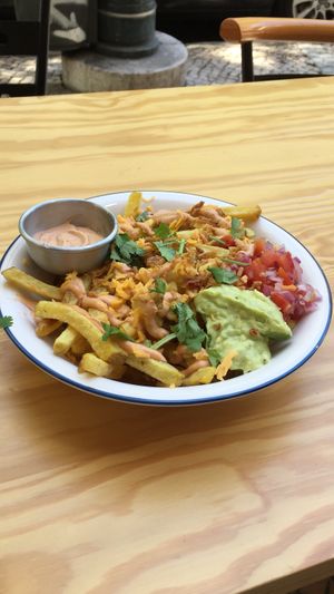 nacho plate (with fries because the nacho chips run out) at Vegan Junkies in Lisbon