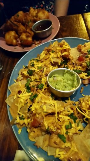 Starters - nachos and bbq wings at Vegan Junkies in Lisbon