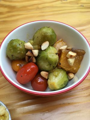 Roasted veggies with spices, sour cream and toasted almonds at Vegan Junkies in Lisbon