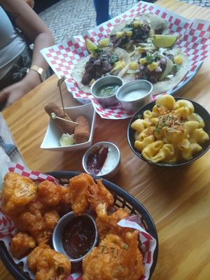 Cauliflower wings, tacos, Mac and cheese, and croquettes at Vegan Junkies in Lisbon