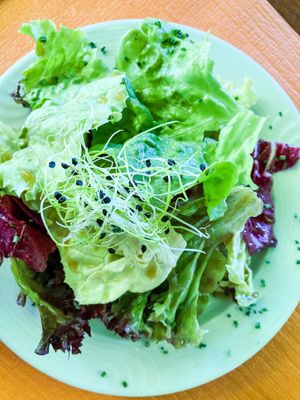 Green salad and vegan dressing at Bahnhof in Kallnach