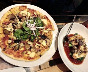 Pizza + mushrooms and broccolini  at Yulli's in Surry Hills