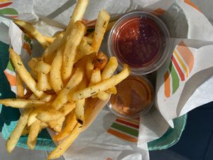 Fries with bbq, ranch, n sihracha ketchup on side at Burger Patch in Sacramento