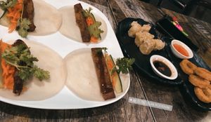 Duck pancakes, fake calamari, and salt and pepper tofu at West End Vegan Restaurant in West End