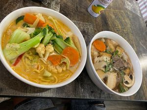 Veggie laksa & beef pho  at West End Vegan Restaurant in West End