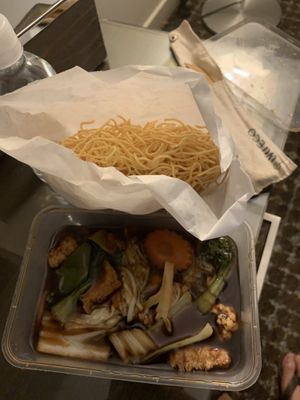 Crispy noodles. Very difficult to eat without a bowl in a hotel. as no room in container. Also, not delicious    at West End Vegan Restaurant in West End