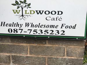 Sign on street at Wildwood Café in Carlingford