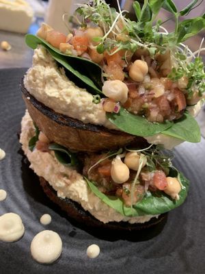 Sourdough bruschetta with hommus, pick de Gallo and sprouts.  Sooo good  at Little Lotus Cafe in Hobart