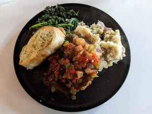 Smashed potatoes, kale, breaded chicken with creole gravy. A bit too salty. Not that I wouldn't get it again.  at Vegan Food House in Dallas