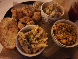 Cauliflower Wings Country Plate (mac and cheese, corn, mashed potatoes, gravy, cauliflower wings, garlic toast) at Vegan Food House in Dallas
