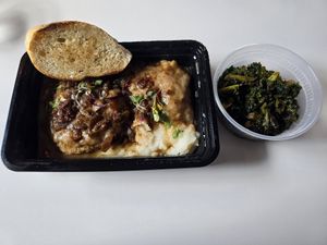 Smothered Chicken Seitan in Creole Gravy at Vegan Food House in Dallas