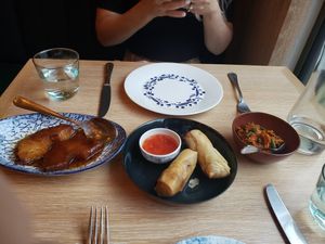Spiced pineapple, spring rolls, green been/coconut salad at Mama Makan in Amsterdam