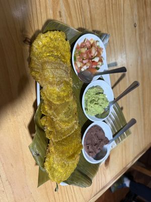 Patacones con pico de gallo, guacamole y frijoles  at La Amistad in Monteverde