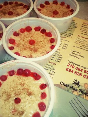 AlmondMilk RicePudding with Vanilla, Raw Brown Sugar, Cinnamon topped with Red Currants at Roots Foods and Culture in Athens