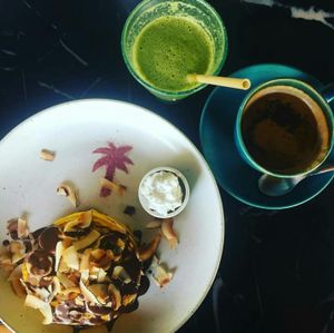 gluten free pumpkin pancakes
seasonal fruits with chocolate sauce and coconut cream  at MOTHER in Ubud