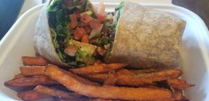Loved the Twist Wrap with grilled chick'n & ranch. Sweet potato fries. at Native Foods in Palm Springs