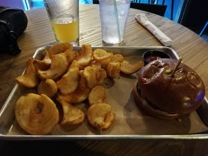 Vegan burger with spice and peanut butter! And with house twisted chips at The Local Bison in Tulsa