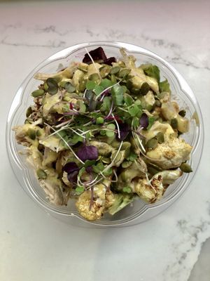 “The Major Stride” Salad. Organic greens, roasted cauliflower, beets, quinoa, pumpkin seeds, topped with organic micro greens and homemade  vinaigrette dressing.     at MIGHTY LOVE FOOD in Boston