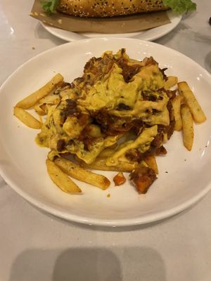 Chilli cheese fries - Already started eating sorry, we were hungry! 😅  at Loving Vegan in Da Nang