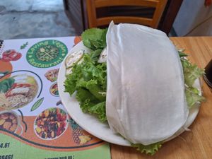 Herbs and rice paper that cones with the omelette at Loving Vegan in Da Nang