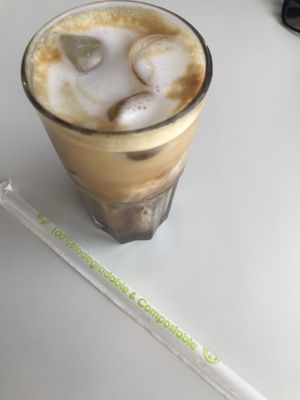 Vegan iced Spanish latte with coconut milk and biodegradable straw. 👏 at Leen's in Dubai