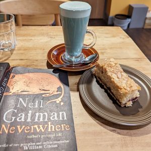 Butterfly pea latte and Bakewell slice 🦋 at Green Earth in Bedford