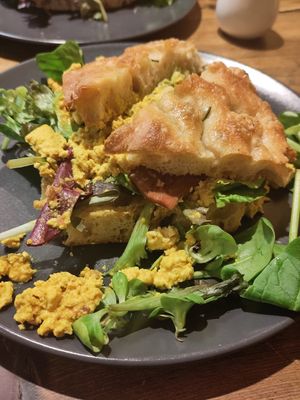 Scrambled tofu and bacon focaccia at Green Earth in Bedford