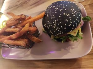 Vegan burger and sweet potato fries at EnVie Vegan in Geneva