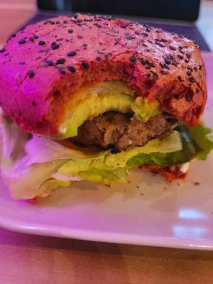 Big Mex Vegan burger first bite...mmm mmm! at EnVie Vegan in Geneva