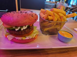 Big Mex burger, fries with spicy sauce. at EnVie Vegan in Geneva