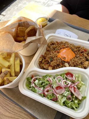 Fried rice with salad, ‘chicken’ nuggets and chips at EnVie Vegan in Geneva
