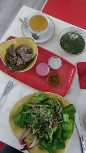 Lunch menu starters: salad with various sprouts (chickpeas, mung beans, sunflower seeds, buckwheat etc.)), very tasty brown lentil soup (warm) and mezze platter at Adoravita in Zug