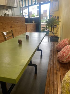 Cozy Interior Seating w/Cute Pillows  at Hijo De Su Madre in Los Angeles