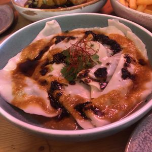 Shiitake and chive gyoza in black garlic umami oil at Chotto Motto in Collingwood