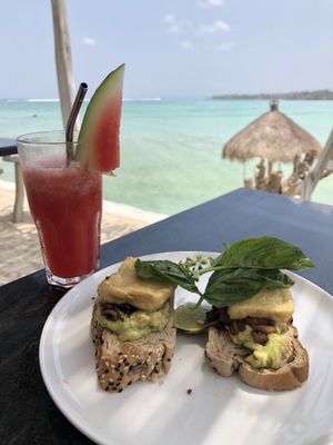 Watermelon juice, avocado toast with mushroom and tofu at The Sand in Lembongan