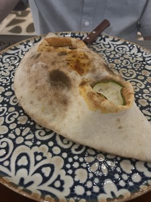 Calzone full of veg and vegan cheese  at d'Angelo in Mykonos