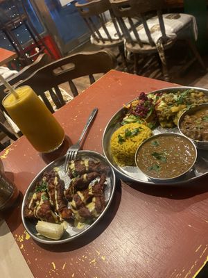 Mango Lassi, with delicious Thali for one serving and tasty Tandoori Wings   at En Root in South West London