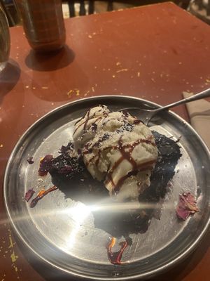 Delicious Raspberry Cacao Brownie with Vegan Vanilla Ice Cream   at En Root in South West London