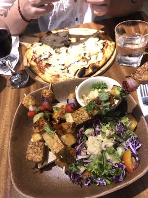 Tempeh bowl and pizza with garlic and mushrooms  at Bong Bonlai at YK Art House in Phnom Penh