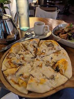 Garlic and truffle pizza 🍕 at Bong Bonlai at YK Art House in Phnom Penh