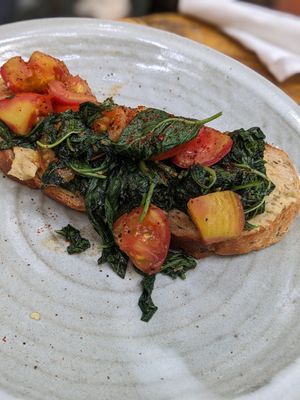 Toast Spinach & Roasted Tomatoes with Hummus 🍞 4.5$ at Bong Bonlai at YK Art House in Phnom Penh