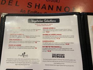 Not only do they have a vegetarian section on the menus, many other items can be easily vegetarian. Even on the happy hour menu they had a veggie dog.   at Cool Cat Cafe in Lahaina