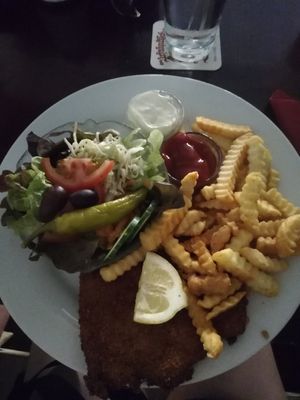 Vegan Schnitzel with fries, salad, ketchup and vegan mayo at Kult in Wurzburg