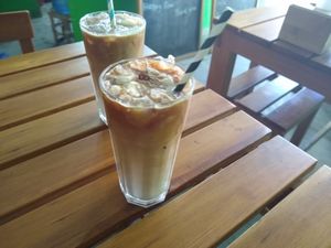 Lattes made with ice from a frozen bottle of distilled water, so tourists can safely suggest the ice. at Organic Smoothie Bowl & Cafe - Lazimpat in Kathmandu
