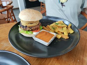 Mushroom and grain burger patty with crunchy fries at Bella by Sage in Ubud