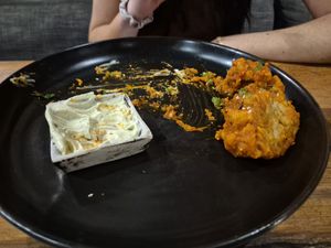 Half eaten buffalo wings - they were unreal at Bella by Sage in Ubud