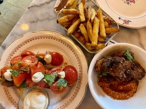 Bruschetta, cauliflower wings, and fries (patatas bravas) at Bloomy in Toulouse