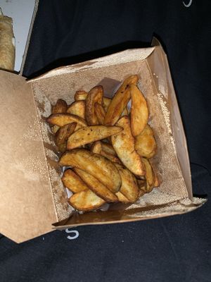 Spicy potato wedges  at Cardiff Pizza Company in Cardiff